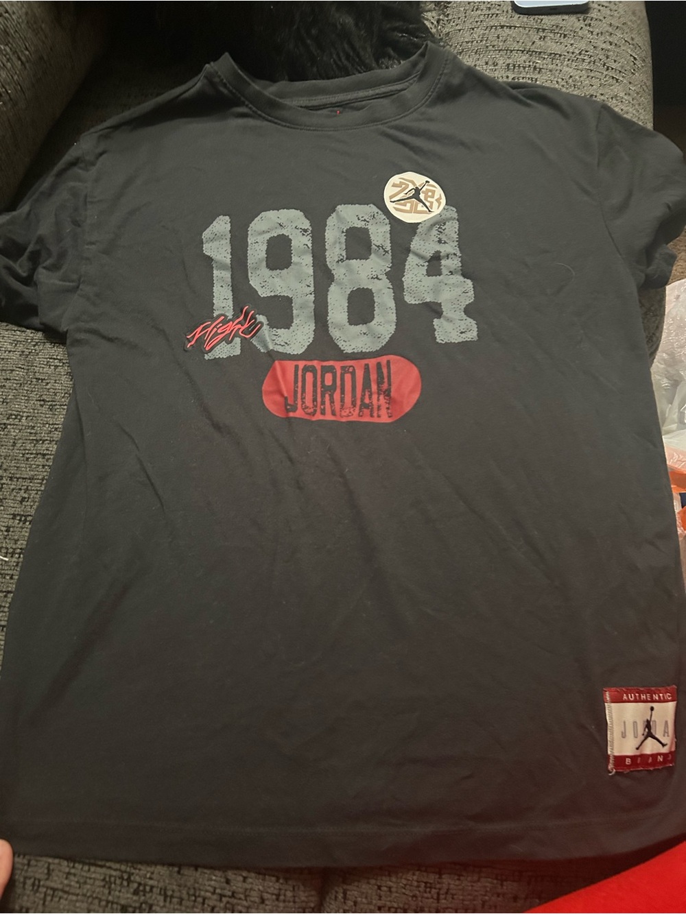 Jordan Black Short Sleeve 1984 Graphic Tee with Red Logo